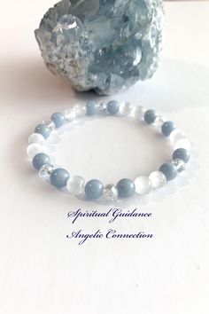 ~ TRANQUILITY ~ INNER PEACE ~ DIVINE SPIRIT, ANGELIC COMMUNICATION ~  This stunning, heavenly bracelet is designed with gorgeous blue Angelite, accented with radiant white Selenite and crystals. A beautiful combo of meditative crystals to assist you with your spiritual guidance journey to connect with your guardian angels. 💫 Angelite is a stone that nurtures inner peace and a sense of calm. It is a great stone for those feeling stressed and overwhelmed. Angelite dispels fear, anger and encourag Bracelet Selling Ideas, Gray Spiritual Bracelet For Gift, Spiritual Gray Bracelets As Gifts, Gray Spiritual Bracelets As Gift, Witchy Crystals, Angel Meditation, Divine Spirit, Celestial Realm, Hope Diamond