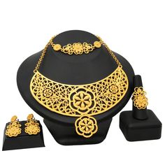 Indian Gold Plated Jewelry Sets Wedding Dubai Choker Necklace Bracelet Earring Ring Nigerian Bridal Set African JeweleryModel Number:1005003058985413 (1) Necklace approx :43cm +5cm. Bracelet approx :19.2cm .One set includes 1 Necklace,1 Bracelet,a pair of Stud Earrings and a Ring. (2) When you go to a banquet, necklace suit will match your dress very well, highlighting your temperament; when you go to a dance party, it will make you look more mature. (3) The jewelry set is packed with a box.Idea Plated Round Jewelry Sets For Wedding, Gold Metal Jewelry For Wedding, Gold Metal Jewelry For Marriage, Gold Wedding Jewelry Sets With Plating, Round Plated Jewelry For Wedding, Plated Round Jewelry For Weddings, Elegant Gold Plated Jewelry Sets For Marriage, Elegant Gold Plated Jewelry For Marriage, Plated Alloy Jewelry Sets For Wedding