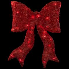 a red bow with lights on it