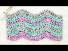 a crochet granny stitch is being worked on