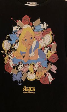 a t - shirt with an image of alice in wonderland on it