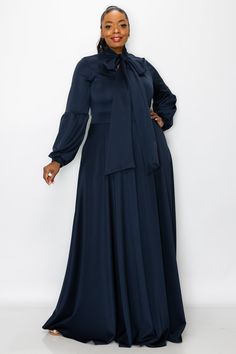 This floor-length dress features practical pockets, elegant bishop sleeves, and a delicate ribbon neck tie, creating a chic and sophisticated look that is perfect for any formal occasion. Bishop sleeves Pockets Ribbon neck tie 95% Polyester 5% Spandex Made in USA w/ Imported Materials Machine wash cold. tumble dry low HPS: 63" Blue Plus Size Dresses, Solid Dress Casual, Mandarin Collar Dress, Solid Midi Dress, Evening Dresses Plus Size, Long Sleeve Casual Dress, Elegant Red, Floor Length Dresses, Tie Dress