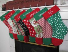 stockings hanging on the mantle in front of a fireplace