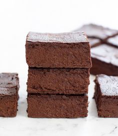 chocolate brownies stacked on top of each other