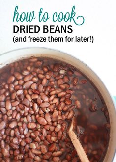 a pot full of cooked beans with a wooden spoon in it and text overlay that reads how to cook dried beans and freeze them for later