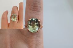 Metal: 14kt Rose Gold Stone: Green Amethyst Stone Shape: Checkerboard Oval-shape Green Amethyst Weight: 1.96 ctw Stone Size: 13.72 x 11.90mm Ring Size: 6 1/4 Sizable: Yes. Please state in size box. Weight of entire piece with stones: 4.40 grams Measurements of Shoulder: 9.19mm Hight Of Ring: 24.47mm Customizable: We can custom make this ring in any metal, with any gem types, shapes, and sizes. Please inquire. Thank you. Elegant Green Amethyst Ring With Accent Stones, Elegant Green Amethyst Ring For Formal Occasions, Elegant Green Amethyst Ring For Anniversary, Luxury Green Amethyst Ring With Accent Stones, Elegant Green Amethyst Round Ring, Elegant Green Amethyst Ring For Wedding, Elegant Green Oval Amethyst Ring, Elegant Green Amethyst Wedding Ring, Elegant Green Amethyst Ring As A Gift