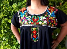 "FREE SHIPPING MEXICO, USA & CANADA Mexican embroidered black Dress Embroidered design and color may vary (see photos) *SPECIAL PACKAGE with Shawl or rebozo has 15% OFF than purchasing every item indivually YOU CAN CHOOSE ANY REBOZO COLOR WITH YOU DRESS - Please write in Order Note - We have more colors than the shown in photos Ideal for a boho and vintage chic look with Folk embroidered flowers, for everyday or beach. The colors are fantastic and the weave in the fabric give it the distinct Black Dresses For Cinco De Mayo Fiesta, Traditional Black Dress For Cinco De Mayo, Traditional Black Embroidered Dress For Fiesta, Traditional Black Fiesta Dress, Traditional Black Dress For Fiesta, Black Embroidered Dress For Fiesta With Floral Details, Black Embroidered Dress For Fiesta, Mexican Embroidery Dress, Mexican Embroidered Dress