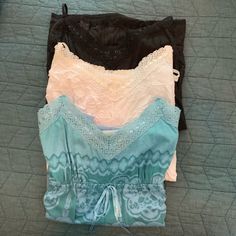 Lot Of Three Dkny Camisole Tunics. Black And Blue Are Nwt And White Is Nwot. All Are Cotton With Crochet Lace Trim. Sleeveless Lace Top For Loungewear, Summer Lace Top For Loungewear, Lace Top For Summer Loungewear, Black Camisole For Spring Loungewear, Black Spaghetti Strap Tops For Daywear, Crochet Lace Trim, Casual Tank Tops, Crochet Lace, Tunics