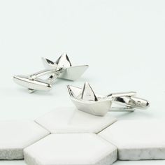 A pair of paper boat silver cufflinks with the option of a personalised chrome box to store them in.These stylish 1st anniversary boat cufflinks are the perfect present for any man or woman, especially anyone with a passion for the nautical. They also make the ideal gift for celebrating a 1st wedding anniversary. They really brighten up a shirt and/or suit and add a touch of nostalgia and fun.The silver tone allows them to work with most attire and they catch the light fantastically.PLEASE READ Silver Cufflinks With Gift Box For Father's Day, Silver Cufflinks With Gift Box, Engraved Box, 1st Wedding Anniversary, Personalized Cufflinks, Special Birthday Gifts, Paper Boat, Paper Anniversary, 1st Anniversary