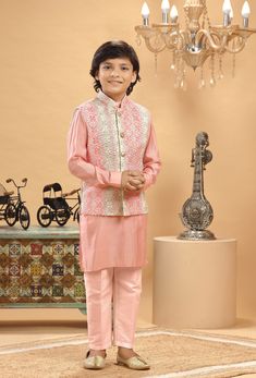 **Specifications : Please visit our brand store for more collection. StitcheryUK.etsy.com  If you need Father and Son same outfits we can make by customised for that kindly message me. Top Details Color- Peach Multi, Fabric - Soft Blended Embroidered Fabric Bottom Details Color- Peach, Fabric - Blended Slik , Style - Elastic Pant Package Include :INCLUDES 1 BANDI, 1 KURTA AND 1 PANT. Turban ,Mojari And Other Accessories Are Not Sold Along With The Dress. CARE: DRY CLEAN ONLY *Additional Informat Pink Nehru Jacket With Resham Embroidery For Reception, Pink Bandhgala With Chikankari Embroidery For Festive Occasions, Pink Bandhgala With Resham Embroidery For Festive Occasions, Pink Kurta With Pearl Embroidery For Eid, Festive Pink Nehru Jacket With Resham Embroidery, Bollywood Style Pink Nehru Jacket With Resham Embroidery, Designer Pink Nehru Jacket With Zari Work, Festive Pink Nehru Jacket With Intricate Embroidery, Pink Anarkali Sherwani For Festive Season