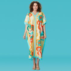 Art by WerkShoppe Studio Choose comfort AND style with these beautiful and colorful caftans made with post-consumer recycled materials. Get ready to redefine at-home casualwear, beach cover-ups, and pool loungewear with these eco-friendly fashions! Reminiscent of the mod 60s, this fun retro-inspired paisley transforms boring into bold and beautiful. Proudly wear that pop of color with confidence and style wherever you are or may be going. Psst – don’t forget to mix and match with a Go Big Towel Multicolor Print Kaftan For Beach Cover-up, Multicolor Beachwear Cover-up For Loungewear, Multicolor Beachwear Cover-up, Multicolor Oversized Casual Cover-up, Multicolor Poolside Cover-up For Resort Season, Casual Oversized Multicolor Cover-up, Multicolor V-neck Kaftan For Loungewear, Oversized Multicolor Beachwear Cover-up, Relaxed Fit Multicolor Kaftan For The Beach