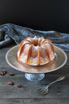 a bundt cake sitting on top of a metal plate