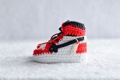 These Crochet Baby Sneakers make a great baby shower gift or can be used for a gender reveal! Have a sneakerhead friend who is expecting a baby, these crochet baby sneakers will surprising them. Cleaning instructions: Please hand wash at 30 degrees with soap. It can be lightly squeezed by hand without twist it. Don't leave it wet for a long time after washing. No ironing. Don't wash in the washing machine. White Sporty Sneakers, White Round Toe Sneakers For Gift, White Crochet Casual Booties, Casual White Crochet Booties, Casual White Handmade Booties, Handmade Casual Booties As Gift, Cute Low-top Sneakers For Gift, White Crochet Round Toe Booties, White Crochet Booties With Round Toe