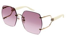 Brand new Gucci GG1562S 004 Rimless Oversized Sunglasses. 100% UVA/UVB protected. Gold frame with tinted pink gradient gradient lens. Size 62-17-140. Comes with Gucci jewel toned case, cloth, satin pouch, and authenticity card.100% authentic. Made in Japan. Retail price $650. Luxury Purple Sunglasses With Gradient Lenses, Fashionable Pink Shield Sunglasses With Uv Protection, Elegant Pink Shield Sunglasses With Uv Protection, Gucci Luxury Shield Sunglasses With Gradient Lenses, Elegant Rimless Shield Sunglasses With Gradient Lenses, Gucci Shield Sunglasses With Tinted Lenses For Summer, Pink Rimless Shield Sunglasses With Gradient Lenses, Luxury Purple Sunglasses For Summer, Trendy Gucci Shield Sunglasses With Gradient Lenses