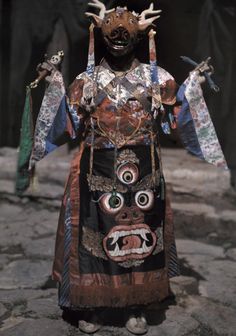 a person dressed in an elaborately designed costume