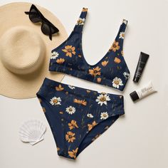 A navy blue bikini set with meadow flowers is the perfect boho chic bikini. The lining is navy blue. Sizes up to 3XL. Bikini is made from recycled material. Bikini top and bikini bottom in the same design are also sold separately in this shop. Please check the sizing chart between the listing photos. Item description: * fabric composition in the EU: 88% recycled polyester, 12% elastane, * fabric weight in the EU (may vary by 5 6.78 oz/yd² (230 g/m * fabric composition in MX: 81% REPREVE recycled Summer Navy Triangle Top Swimwear, Navy Triangle Top Swimwear For Summer, Summer Style Navy Triangle Top Swimwear, Navy Summer Swimwear For Beach Party, Navy Swimwear For Summer Beach Party, Navy Swimwear For Beach Party In Summer, Navy Beachwear Swimwear For Spring, Navy Beachwear For Spring, Bohemian Blue Swimwear With Floral Print