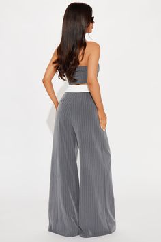 Available In Grey. Pant Set Vest Top Halter Strap Front Button Closure Wide Leg Trouser Fold Over Contrast Waistband Moderate Stretch 32" Inseam Self: 65% Polyester 32% Rayon 3% Spandex Contrast: 96% Polyester 4% Spandex Imported | Work Wife Material Pant Set in Grey size Large by Fashion Nova Grey Pants Outfit, Grey Pant, Work Wife, Wife Material, Top Halter, Halter Strap, Grey Pants, Pant Set, Vest Top