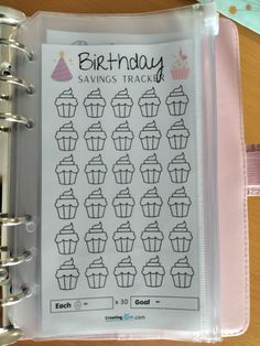 a birthday planner with cupcakes on it