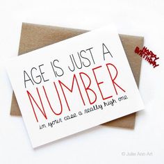 a card with the words age is just a number on it next to a red pin