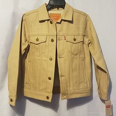 Levi's Trucker Jackets.Size Medium Junior Or Fit Ages 10 To 12 Years Old, Fit Small Short Womens Also.Color Khaki.Shoulder To Bottom 21" Long And Breast Laying Flat 17".Heavy Duty...Make An Offer. Levis Jacket, Trucker Jacket, Color Khaki, Jean Coat, Jean Jacket, Levi's, Heavy Duty, Jackets & Coats, Jackets For Women