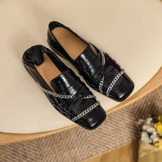 These loafers are designed in a timeless, minimal silhouette, so you'll be sure to wear them often. Made from soft leather, soft bottom that ensure all-day comfort. Wear yours with tailoring and denim alike. Color: Beige/BlackMaterial: CowhideLining: CowhideInsole: CowhideSole: RubberHeels: 3 cm/1.18"Weight: 0.33kg Each Shoes (measured size 8.5) Fit: Medium to Wide, Runs Normal.Origin: Made in China Production Time: About 5-7 days (Any exceptional case will email you, Please pay attention to you Chain Strap Loafers With Round Toe For Work, Chic Office Loafers With Chain Strap, Black Chain Strap Loafers For Work, Elegant Loafers With Chain Strap And Round Toe, Black Loafers With Chain Strap And Round Toe, Elegant Leather Loafers With Chain Strap, Luxury Black Leather Tassel Loafers, Luxury Modern Slip-on Tassel Loafers, Luxury Semi-formal Tassel Loafers With Rubber Sole