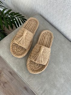 Slippers "Ju Ju" Unique and eco-friendly "Ju Ju" slippers, beautifully adorned with two decorative tassels. Crafted from high-quality 100% jute (plant fiber), these stylish slippers combine attractive design with sustainable materials, making them perfect for both indoor and outdoor wear. 🌈 Color: Natural beige. Details: ✨ Made from natural materials - 100% jute (plant fiber). ✨ Features a durable rubber sole, securely glued and stitched with waxed thread. ✨ Provides a soothing massage effect a Gift To Sister, Knit Slippers, Decorative Tassels, Ju Ju, Plant Fibres, Slippers Cozy, Knitted Slippers, Outdoor Wear, Womens Slippers