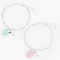 Your bestie is like the other half of your heart, so here's a beautiful way to show her how much she means to you. This set includes one bracelet for you and one for her, each with with a heart-shaped lock charm, plus a little "BFF" key charm. Pack Size: 2 Length: 6" + extender Closure: Lobster clasp Material: Metal - Claire's Best Friends Heart Lock Charm Bracelets - 2 Pack Nickel Free Heart Bracelet For Valentine's Day, Heart Charm Bracelet For Friendship And Mother's Day, Nickel-free Heart Bracelet For Valentine's Day, Nickel Free Heart Charm Bracelet For Friendship, Valentine's Day Best Friend Gift Heart Charm Bracelet, Nickel-free Heart Charm Bracelet For Friendship, Heart Shaped Nickel Free Friendship Charm Bracelet, Mother's Day Heart Charm Bracelet For Friendship, Double Heart Charm Bracelet For Valentine's Day