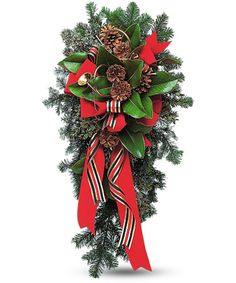 a christmas wreath with pine cones and red ribbon