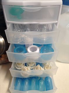 an image of plastic containers stacked on top of each other in order to store items