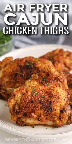 air fryer cajun chicken thighs on a white plate