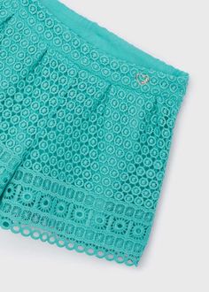 Upgrade your child's wardrobe with the Mayoral Guipure Lace Shorts. Made with 100% polyester, these stylish shorts feature a delicate guipure lace outer layer. The soft lining, composed of 80% polyester and 20% cotton, ensures comfort and breathability for your young fashionista. Add a touch of elegance to any outfit with these pretty lace shorts. Spring Cotton Bottoms With Crochet Lace, Spring Cotton Crochet Lace Bottoms, Green Lace Bottoms For Spring, Spring Lace Shorts With Crochet Trim, Lace Shorts With Crochet Trim For Spring, Short Crochet Lace Bottoms For Spring, Spring Crochet Lace Short Bottoms, Spring Crochet Lace Shorts, Lace Bottoms With Crochet Trim In Short Style