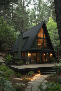 a house in the woods with stairs leading up to it