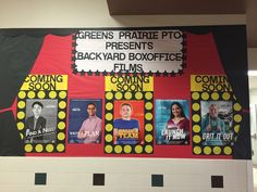 a bulletin board with movie posters on it in front of a school gym wall that says, greens prairie pto presents backyard box office films coming soon