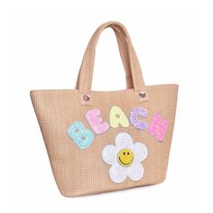 Get transported to a tropical paradise with this chic 'Beach' handbag-inspired tote bag! This standard-sized tote is constructed out of soft straw for comfortable wear and embellished with the playful details you know and love from OMG - including heart-shaped gem accents and a large sparkly daisy patch! Island time is just one tote away! Dimensions10.375”H x 18.5”W x 5”D Rectangular Sand-colored Straw Bag, Sand Colored Tote Beach Bag, Sand-colored Tote Beach Bag, Sand-colored Tote Beach Bag For Beach Season, Eco-friendly Tote Bag For Beach Season, Sand-colored Straw Tote Bag, Beige Tote Beach Bag For Beach Season, Summer Double Handle Gift Bag, Beachy Bags For Shopping During Beach Season