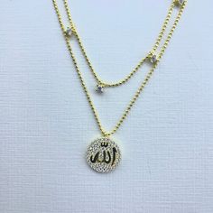 Disc God name Allah necklace Allah name necklace, Allah symbol, Allah pendant Muslim pendant Islamic necklace tears of Allah Arabic name, Allah charm Allah jewelry Allah chain Sterling silver over gold plated anti tarnish anti allergenic nicel free This is a safe way for you to store necklace will be sent along with a beautiful gift box and pouch All items purchased will be shipped within 1-3 business days. If you wish to upgrade your shipping feel free to contact me. Please see my policies sect Personalized Silver Color Gold Plated Charm Necklaces, Personalized Silver Gold Plated Charm Necklaces, Personalized Silver Gold-plated Charm Necklaces, Gold Necklace With Name On Round Pendant, Gold Pendant Name Necklace With Cubic Zirconia, Silver Gold-plated Name Necklace With Clavicle Chain, Gold Name Necklace With Cubic Zirconia Pendant, Gold Cubic Zirconia Name Necklace, Gold Cubic Zirconia Clavicle Charm Necklace