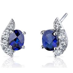 METAL SPECIFICATIONS Metal Name: White Gold 14K STONE SPECIFICATIONS Stone Name: SAPPHIRE & DIAMOND Stone Cut: Oval & Round cut Stone Specifications: There is one sapphire in the center of approx. 1.00 carats & 3 round diamonds on the side approx. 0.15 carats each (approx dia 3.3 mm) in each earring. Natural earth mined stones. Total Stone Weight: approx. 2.90 carats Color: Blue/F Clarity: AAA/VVS1 Blue Sapphire Studs, Diamond Earrings Studs Round, Sapphire Earrings Studs, Sapphire Studs, Round Diamond Engagement Rings, Diamond Stud Earrings, Sapphire Earrings, Diamond Stud, Natural Earth