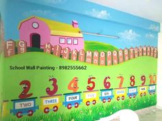 there is a colorful wall mural in the children's room with numbers on it