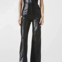 Alice & Olivia Faux Leather Black Flare Leg Corset Jumpsuit Size 8 Nwt Sleek Silhouette Made Out Of 100% Polyurethane. Designed With Zipper And Front Hook And Eye Closer. Dry Clean Only Corset Design Top With Elastic Back Front Rise: 10 7/8” Back Inseam: 15 7/8” Inseam: 34 1/2” Leopard Flares, Corset Jumpsuit, Striped Flare Pants, Flare Dress Pants, Corset Design, Vegan Leather Boots, Olivia Black, Wide Leg Dress Pants, Black Flare