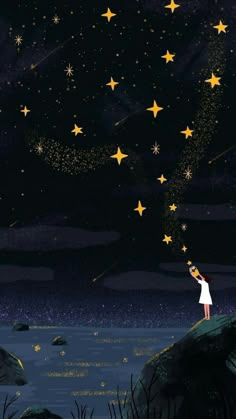 a girl looking up at the stars in the sky