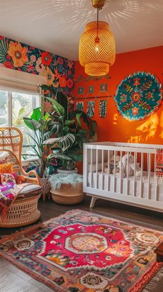 a room with an orange wall and colorful rugs on the floor next to a white crib