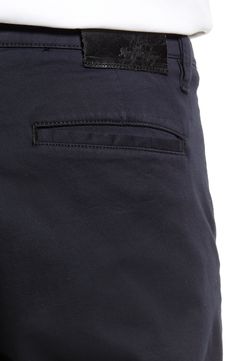 Softly washed to old-favorite perfection, these flat-front chinos give you the comfort of cotton and lyocell with a touch of easy stretch. 56% cotton, 42% lyocell, 2% elastane Machine wash, dry flat Made in Turkey Classic Chinos With Hip Pockets For Everyday Wear, Classic Everyday Chinos With Hip Pockets, Everyday Chinos With Five Pockets, Classic Cotton Chinos With Five Pockets, Everyday Chinos With Patch Pockets, Everyday Cotton Chinos With Welt Pockets, Everyday Cotton Chinos With Patch Pockets, Classic Cotton Chinos With Patch Pockets, Cotton Chinos With Patch Pockets And Straight Hem