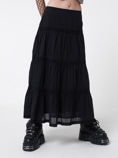 Grunge princess, incoming. The maxi skirt your wardrobe needs. Ruffle maxi skirt in black All-over crochet lace trims Low waist Maxi length Invisible side zipper Light cotton lining 100% cotton Maja Bons wears size S and is 167 cm | 5'6" tall Long Black Skirt Grunge, Long Grunge Skirt, Maxi Skirt Png, Aesthetic Fairy Grunge, Black Flowy Skirt, Gender Euphoria, Goth Skirts, Black Ruffle Skirt, Goth Skirt