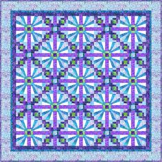 a blue and purple quilt with an intricate design