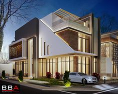 a car is parked in front of a modern house at night with its lights on