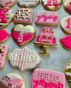 decorated cookies are displayed on a table