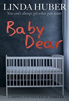 a baby crib in front of a black wall with the words baby dear written on it