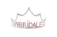 a tiara with the word bride spelled in pink and white crystals on it's side