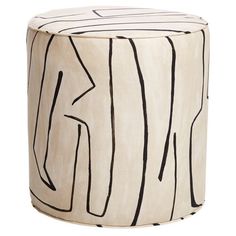 a white stool with black lines on it