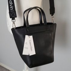 Women's Calvin Klein Pebble Mono Tote Cross Body Color Black Black Bags For Workwear In Spring, Black Bags For Spring Workwear, Calvin Klein Bags, Calvin Klein Bag, Body Color, Calvin Klein Black, Body Colour, Womens Calvin Klein, Cross Body