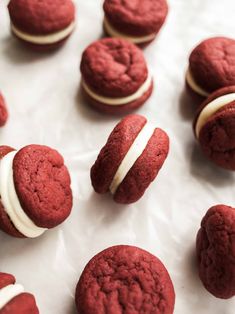 red velvet cookies with white frosting on top